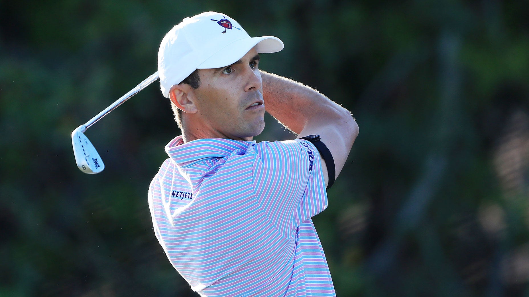 Billy Horschel hits an iron shot.