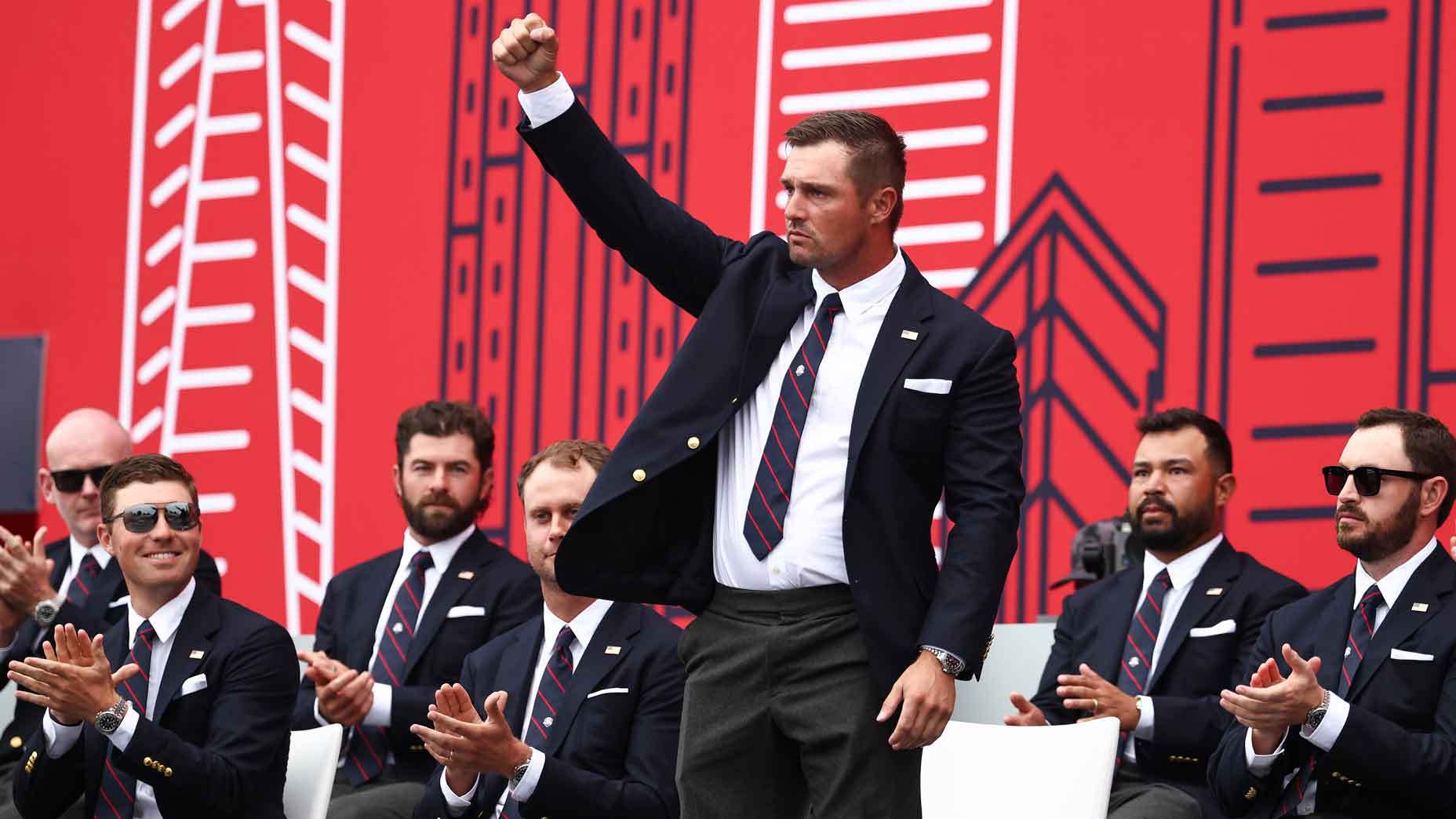 Bryson DeChambeau of Team United States acknowledges the crowd during the opening ceremony for the 2025 Ryder Cup at Black Course at Bethpage State Park Golf Course on September 24, 2025 in Farmingdale, New York.