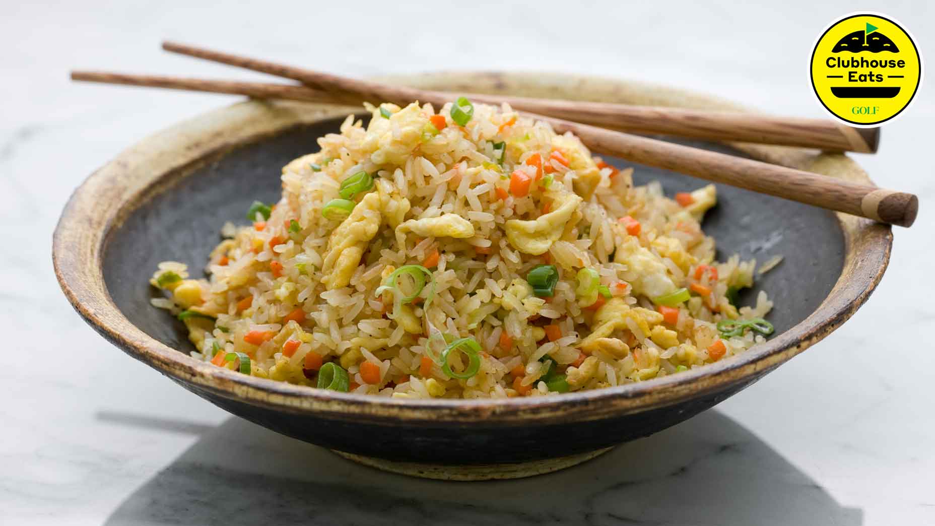 a stock photo of a bowl of fried rice