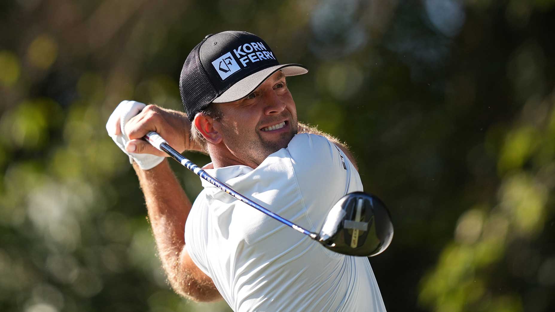 Taylor Montgomery hits a tee shot.