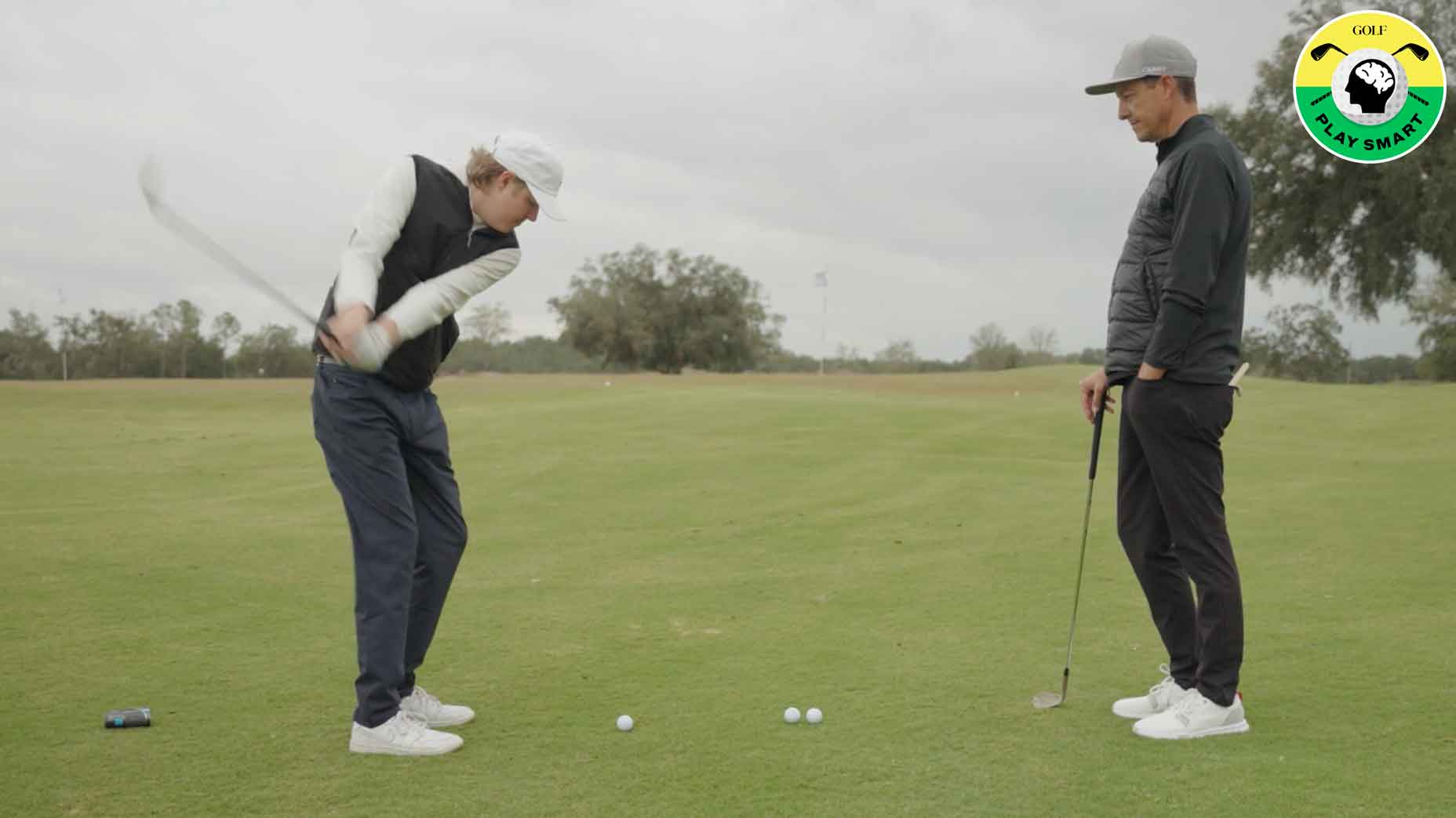 zephyr melton hits wedge while parker mclachlin watches
